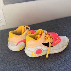 Donovan Mitchell’s Nike Kids Sneakers in Pink and Yellow